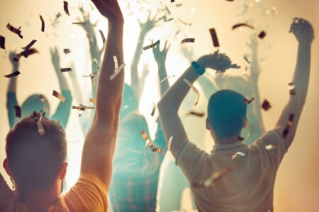 nightlife_disco_concept_young_people_are_dancing_club_outdoor_sunlight_happiness_holidays_youth_concepts_female_male_hands_silhouettes_smoke